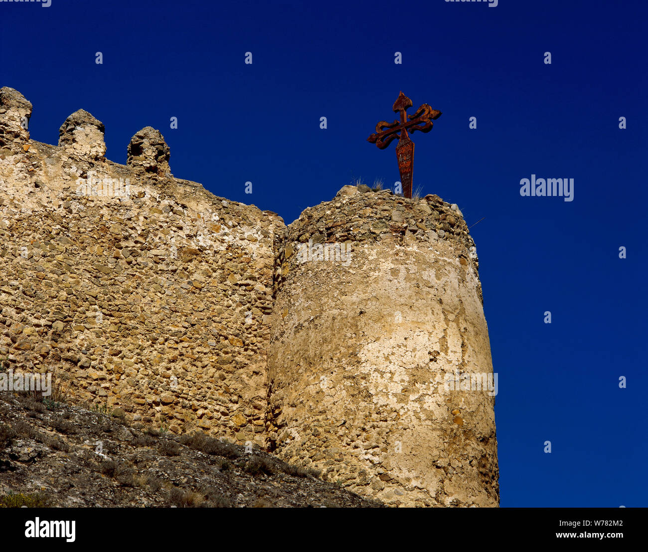 Spain. La Rioja. Clavijo. Medieval castle, architectural detail. A large cross of Santiago stuck upon a tower recalls the legend Battle of Clavjio in 844, which took place during the Reconquest. La Rioja Baja. Stock Photo