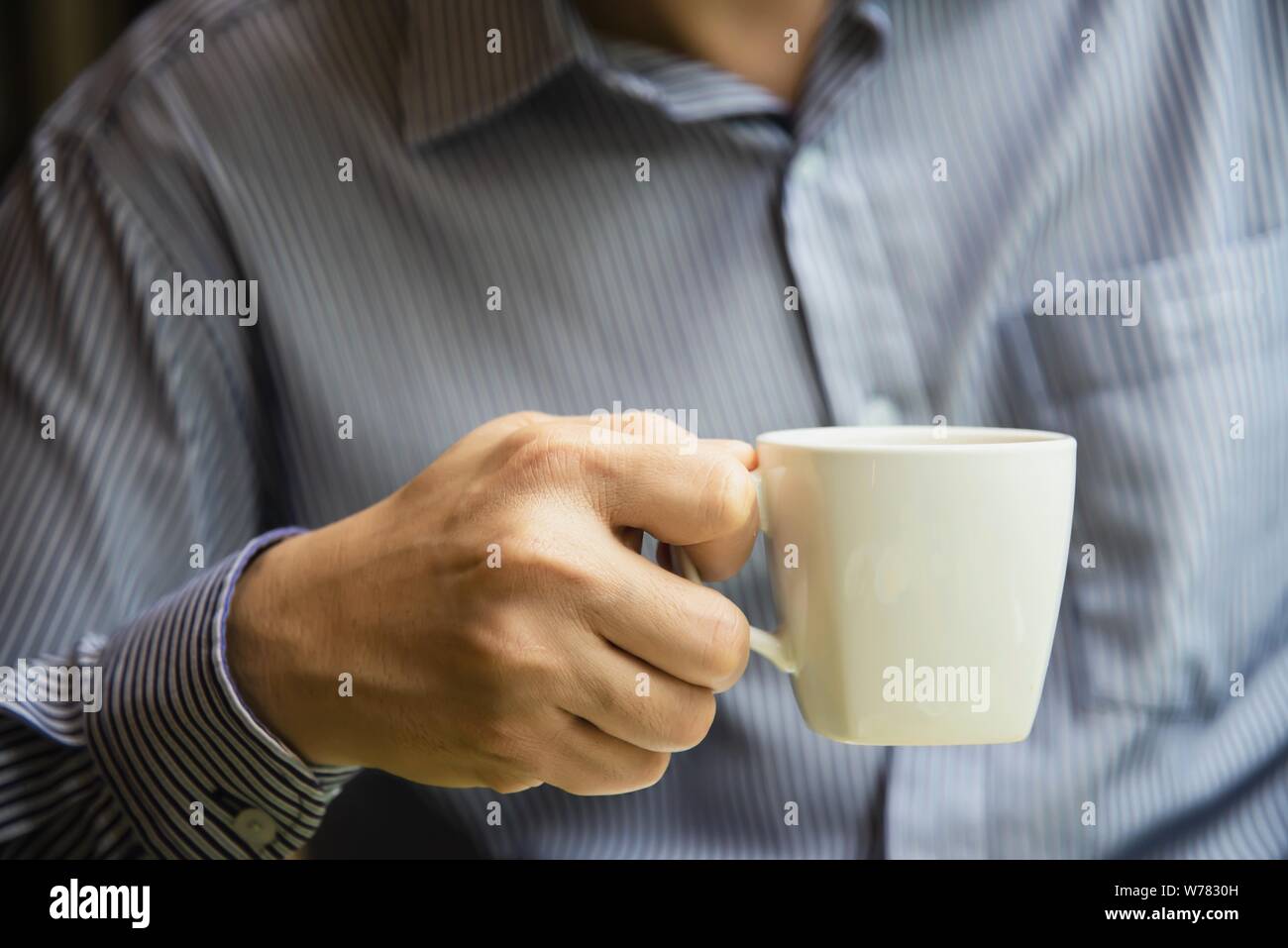 Business man eat the American breakfast set in a hotel - people take a breakfast in hotel concept Stock Photo