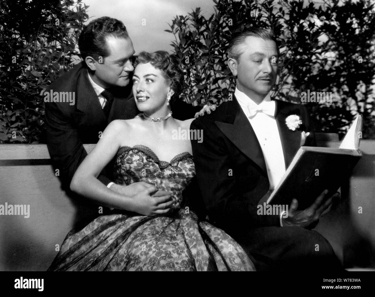 FRANK LOVEJOY, JOAN CRAWFORD & ROBERT YOUNG  Character(s): Matt Cole, Agatha Reed, Doctor James Merrill  Film 'GOODBYE, MY FANCY' (1951)  Directed By VINCENT SHERMAN  19 May 1951  AFF24800  Allstar Picture Library/WARNER BROS  **WARNING**This Photograph is for editorial use only and is the copyright of WARNER BROS  and/or the Photographer assigned by the Film or Production Company & can only be reproduced by publications in conjunction with the promotion of the above Film. A Mandatory Credit To WARNER BROS is required. The Photographer should also be credited when known. No commercial use can Stock Photo