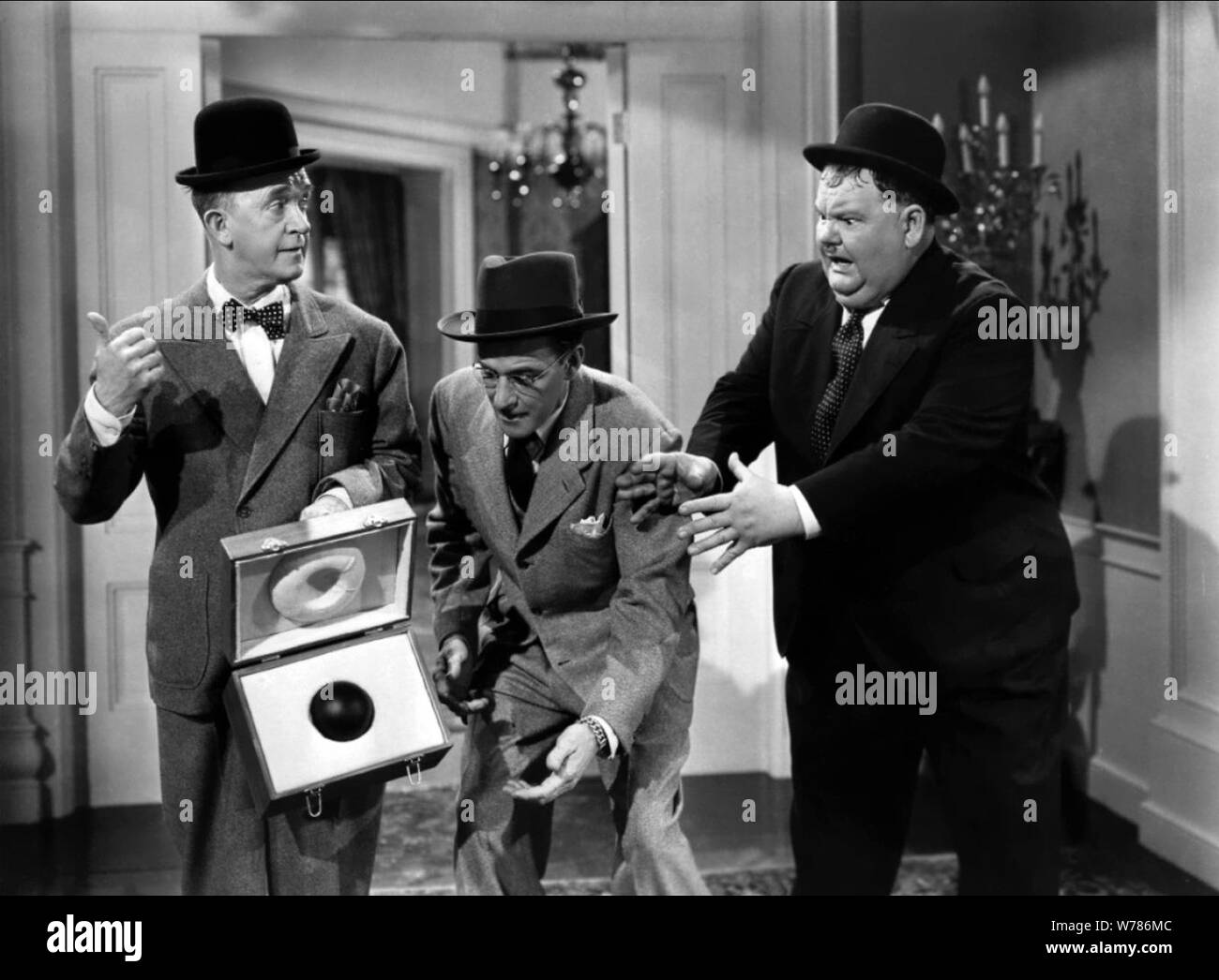 STAN LAUREL, ARTHUR SPACE, OLIVER HARDY, THE BIG NOISE, 1944 Stock Photo