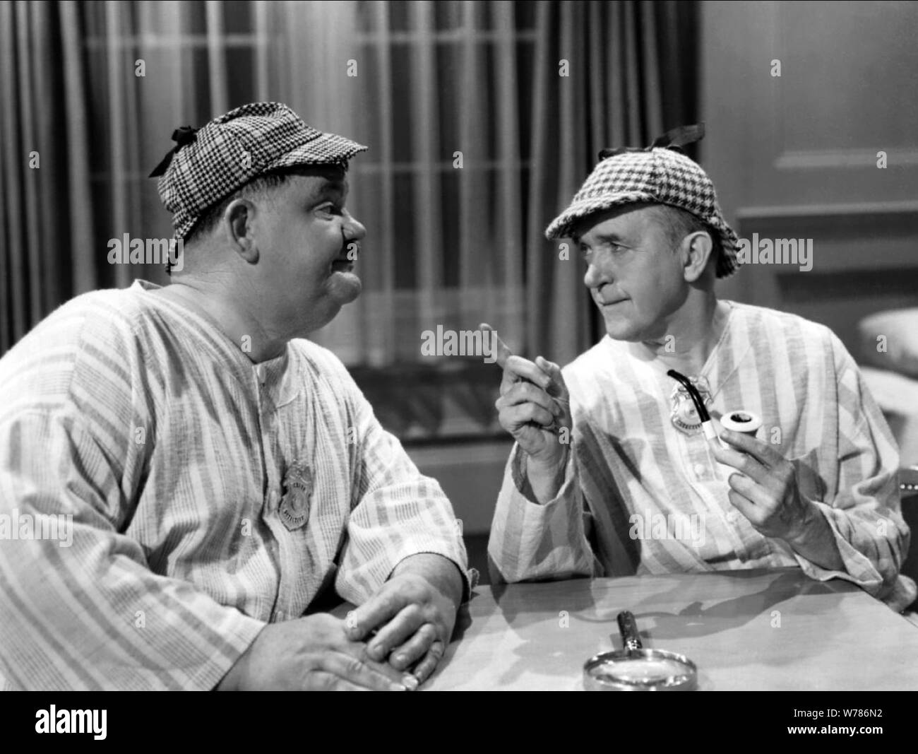 OLIVER HARDY, STAN LAUREL, THE BIG NOISE, 1944 Stock Photo