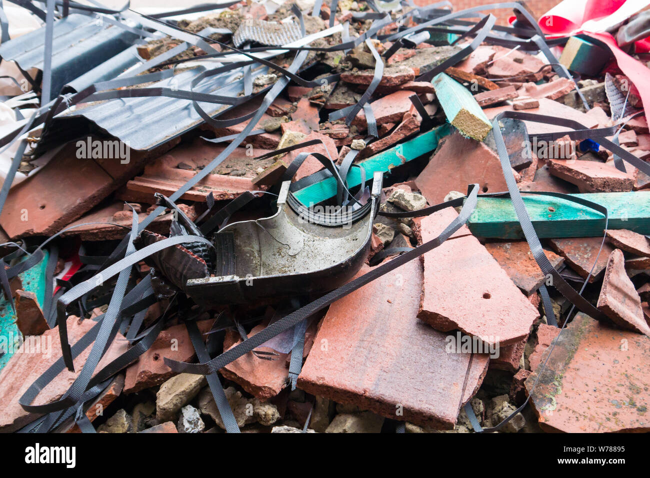 Assorted Roofing Waste in a Skip Stock Photo Alamy
