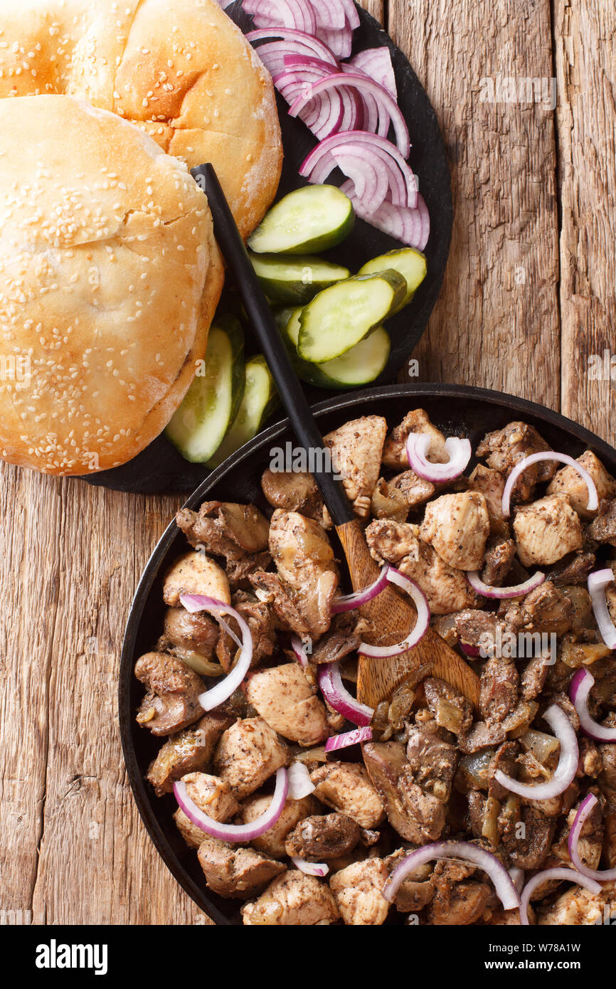 Freshly prepared Jerusalem mixed grill from chicken and offal closeup