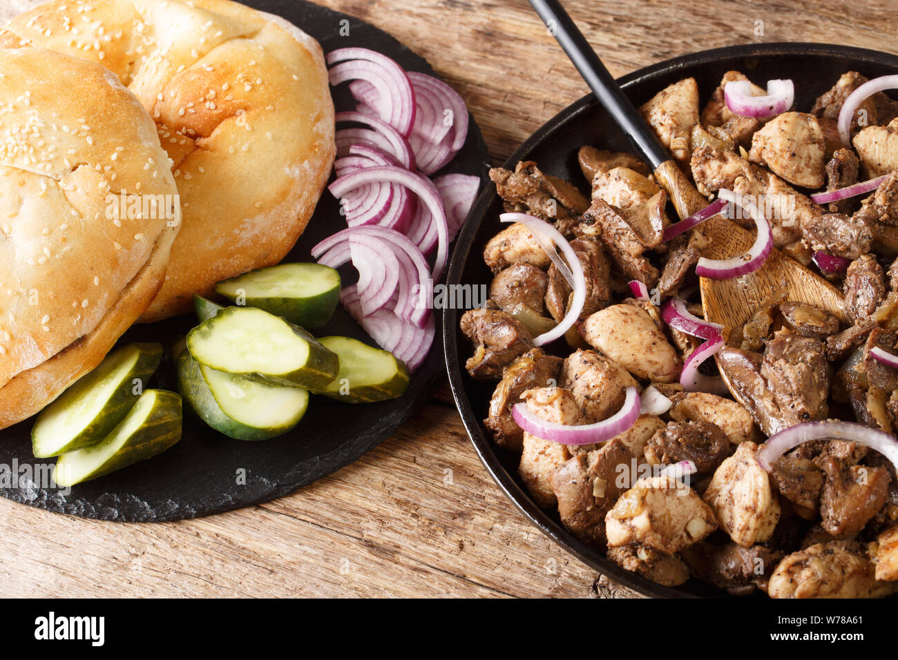Israeli cuisine meorav Yerushalmi from chicken and offal close-up on a plate on the table. horizontal Stock Photo