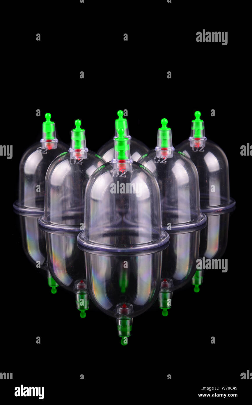 Acupuncture therapist equipment or Bekam Hijamah over black background