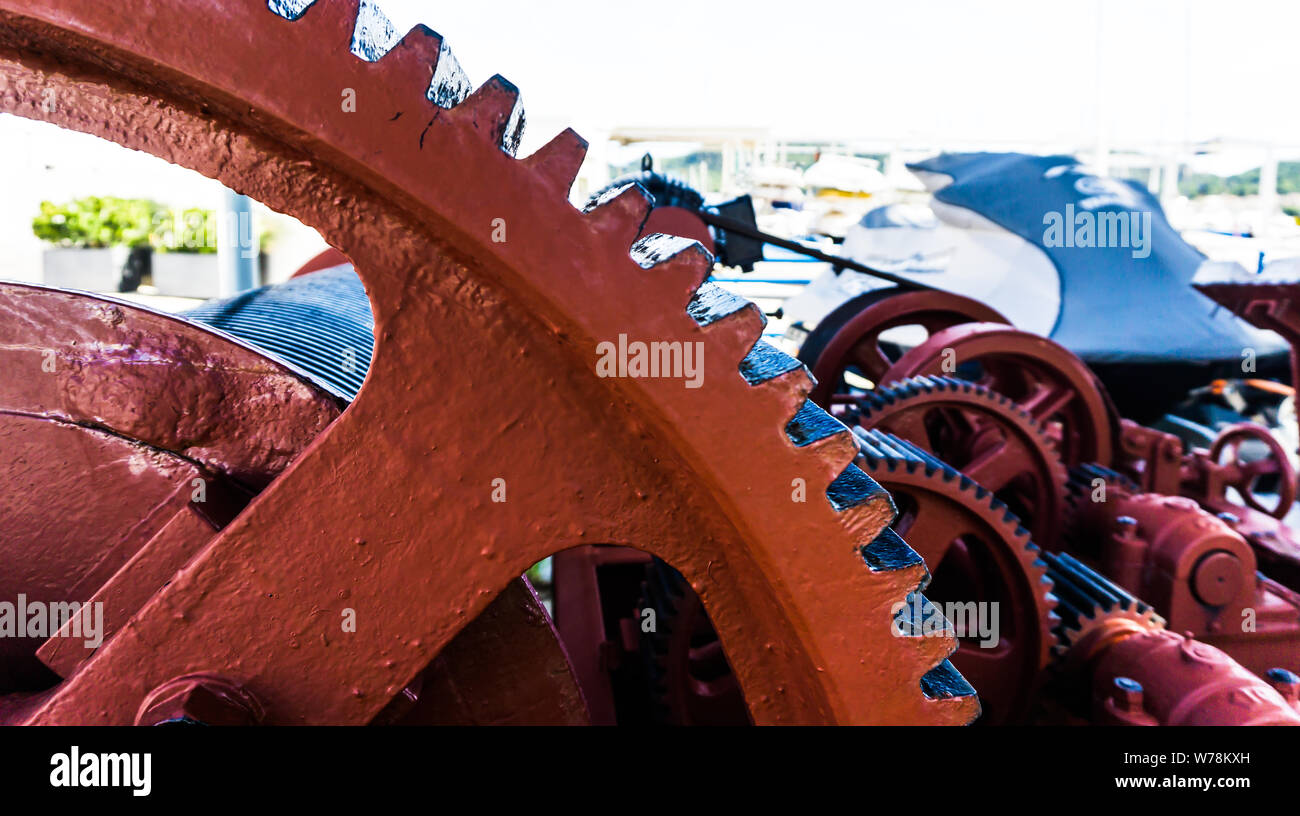 red and black gears of a machine Stock Photo