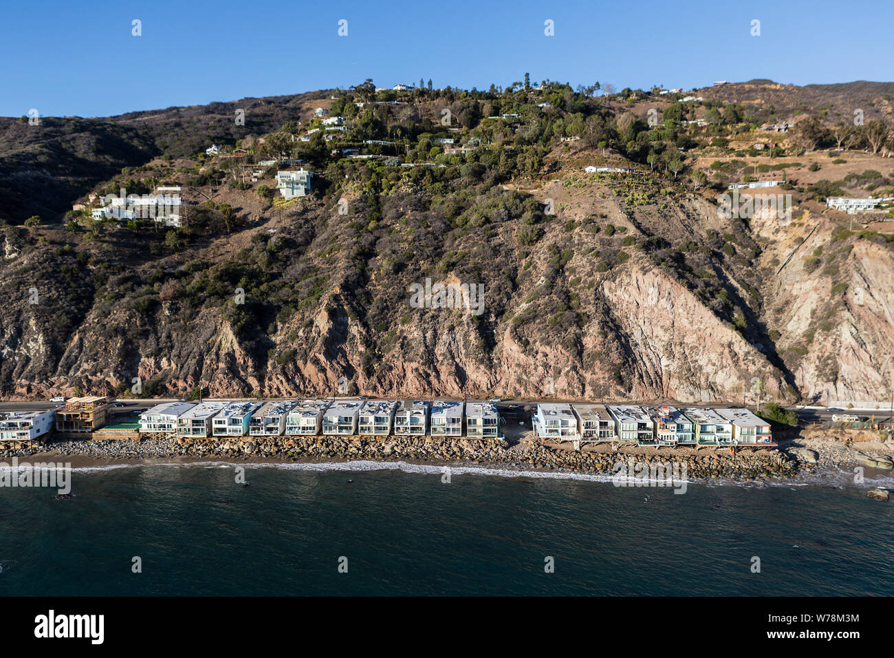Aerial of shoreline and hillside homes near Los Angeles and Santa Monica on Highway 1 in Malibu, California. Stock Photo