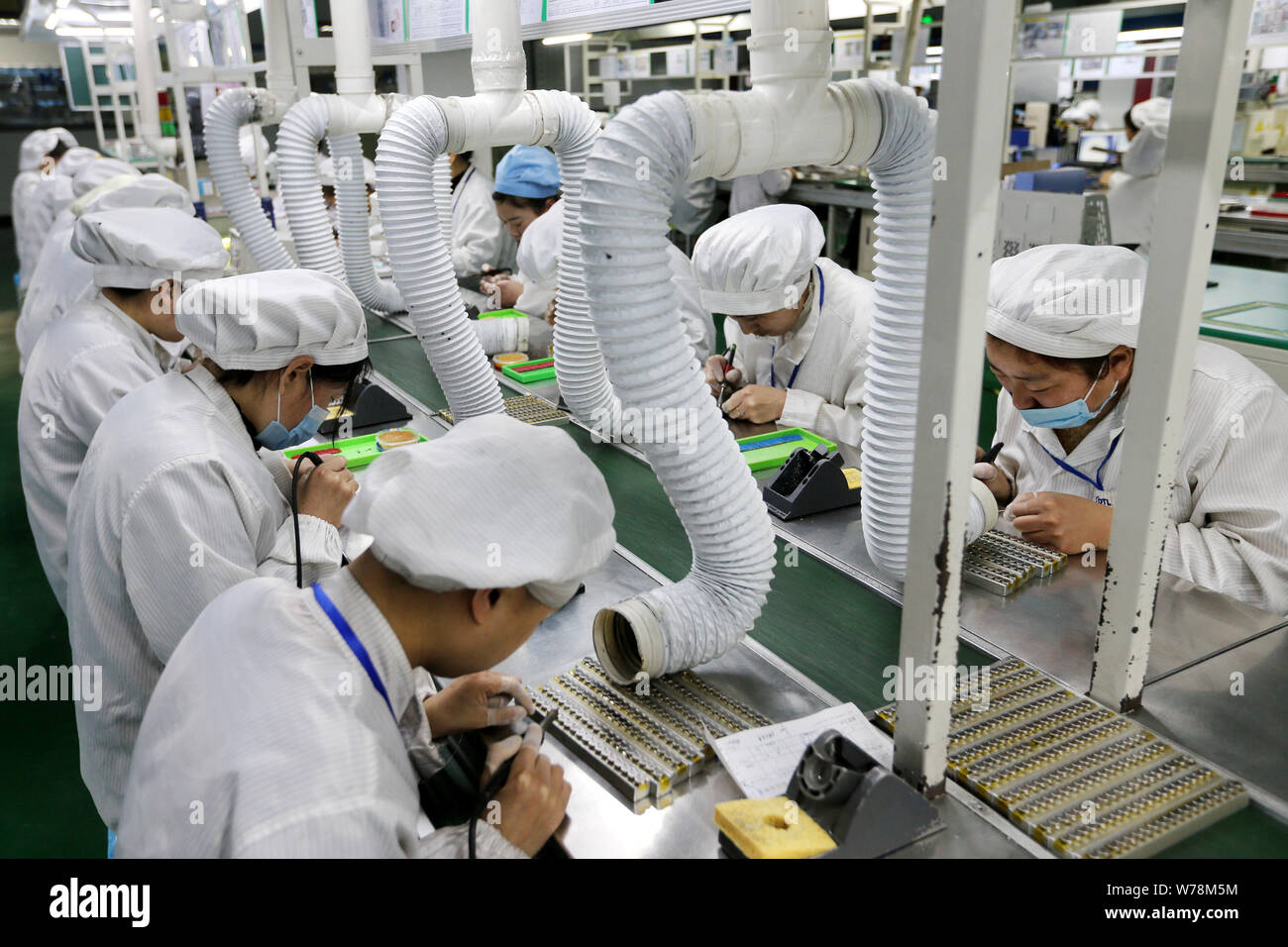 Mobile phone assembly line hires stock photography and images Alamy