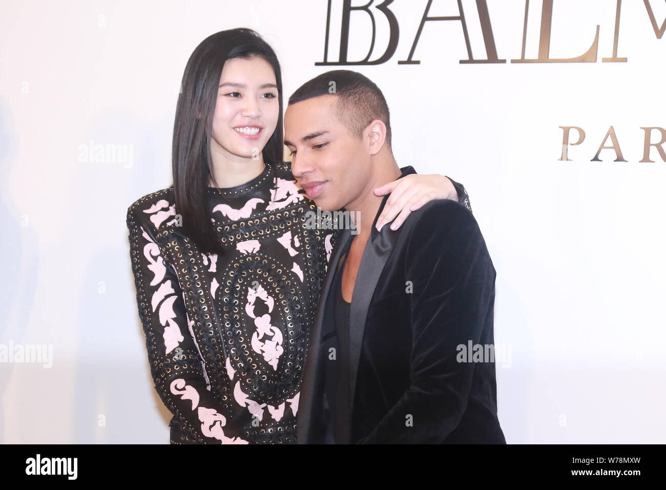 French fashion designer Olivier Rousteing, right, the creative director of  Balmain, and Chinese model Xi Mengyao, better known as Ming Xi, attend the  Stock Photo - Alamy