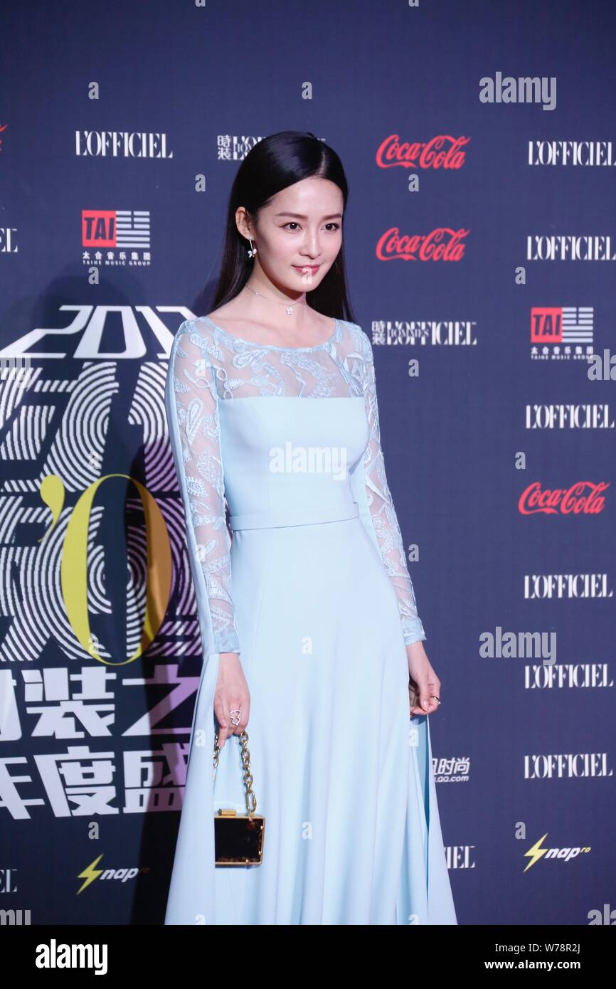 Chinese actress Li Qin poses as she arrives at the red carpet for 