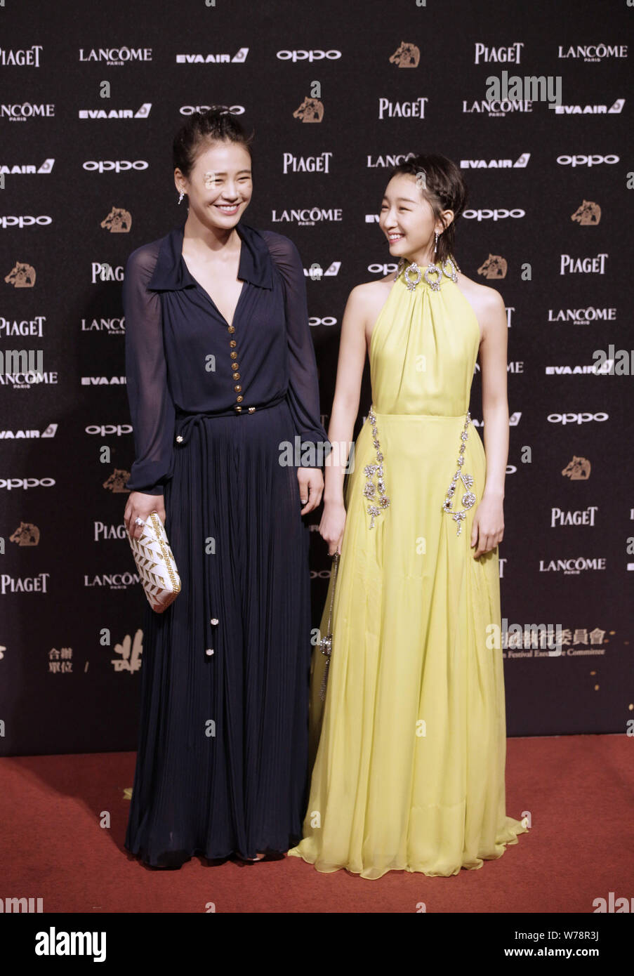 Chinese actresses Sandra Ma Sichun, left, and Zhou Dongyu arrive on the