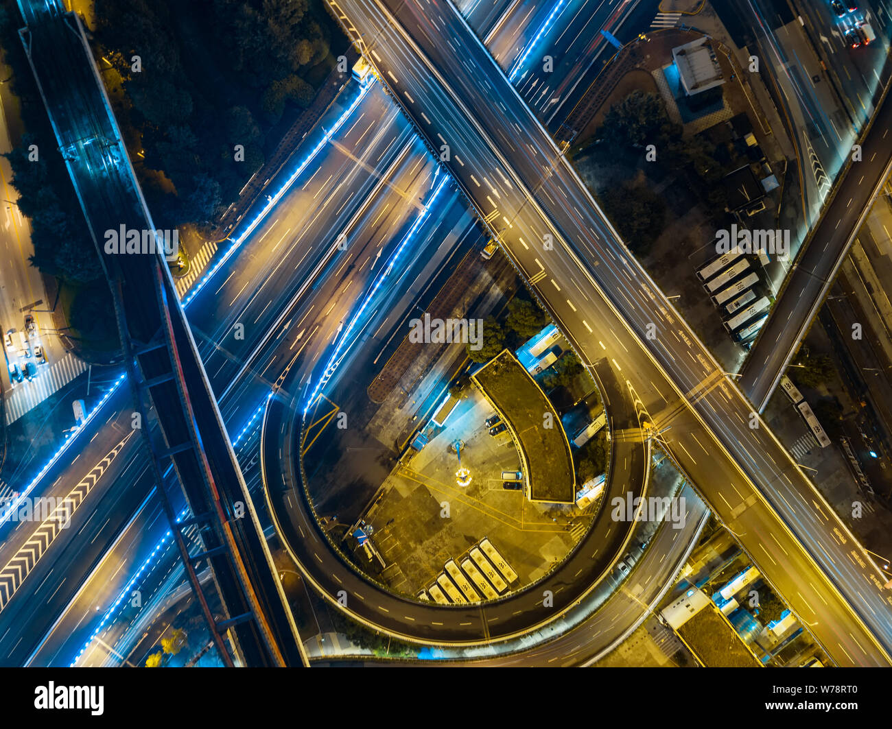 Aerial view of the crossings of elevated interchange overpasses at night in Shanghai, China, 23 September 2017. Stock Photo