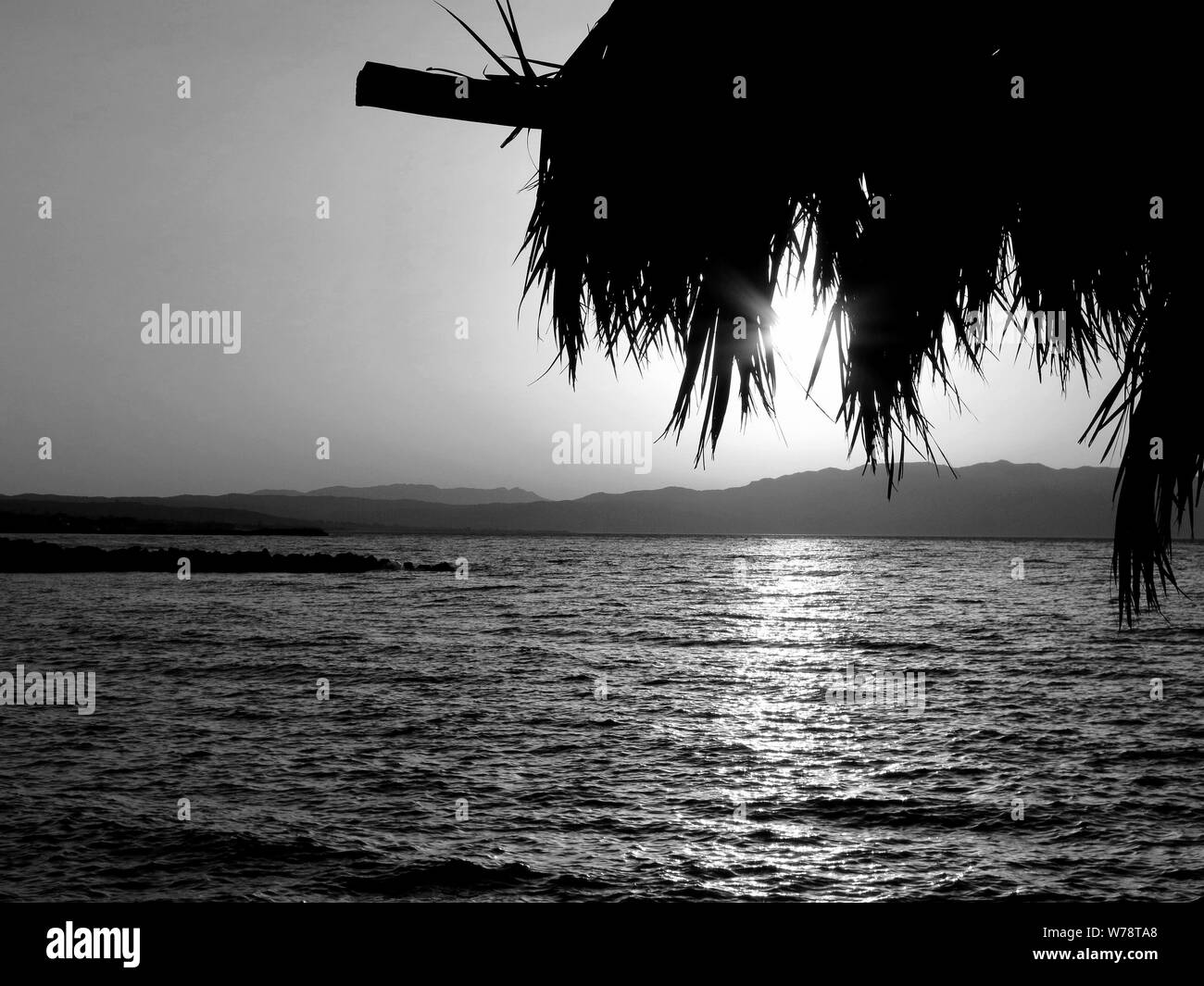 Part of a hut as seen during sunset. Stock Photo