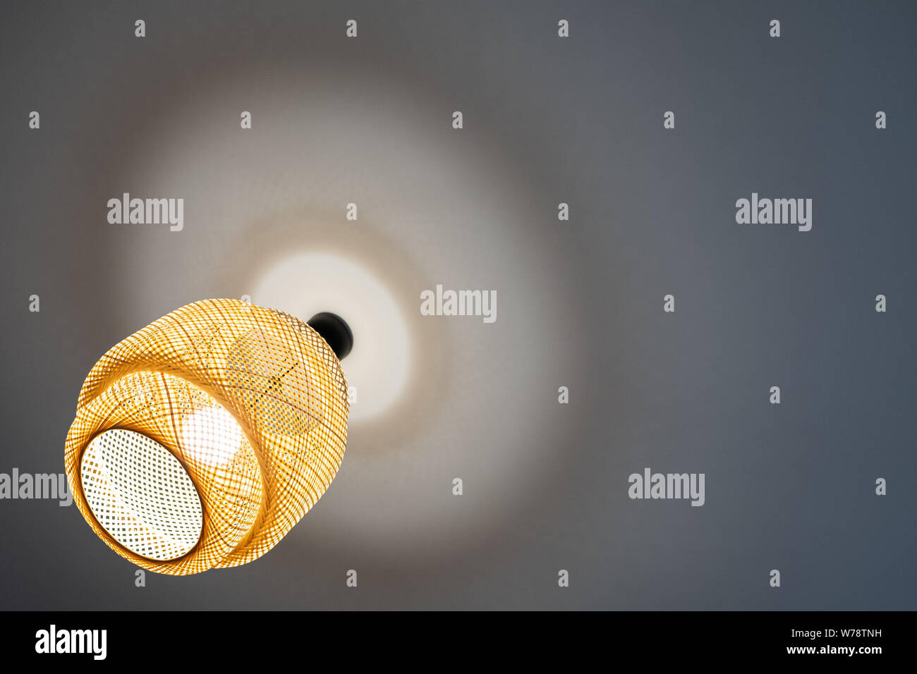 Circle shaped modern lamp on an interior home design Stock Photo