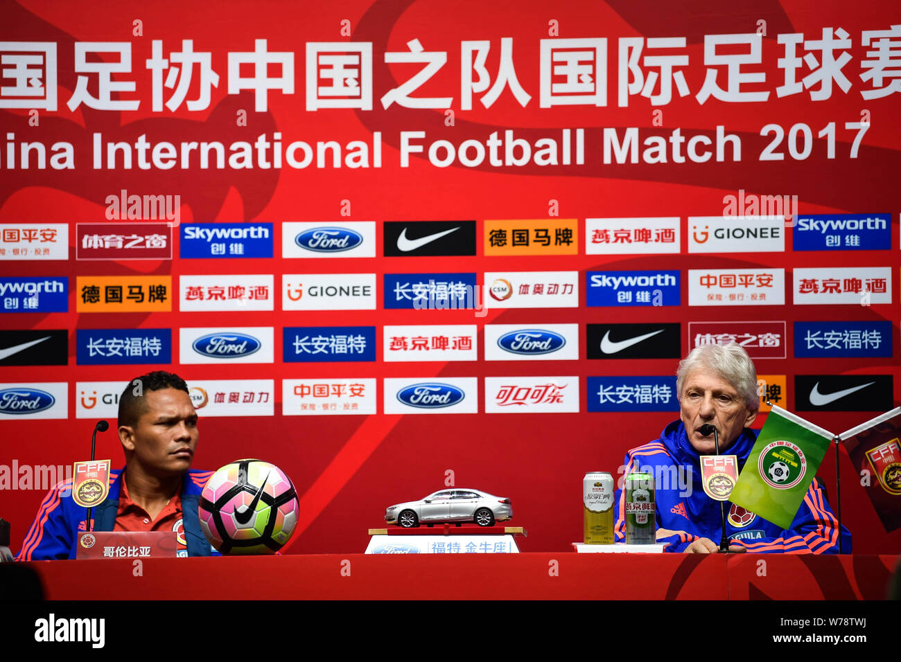 Colombian football player Carlos Bacca, left, and head coach Jose Pekerman of Colombian national men's football team attend a press conference for the Stock Photo
