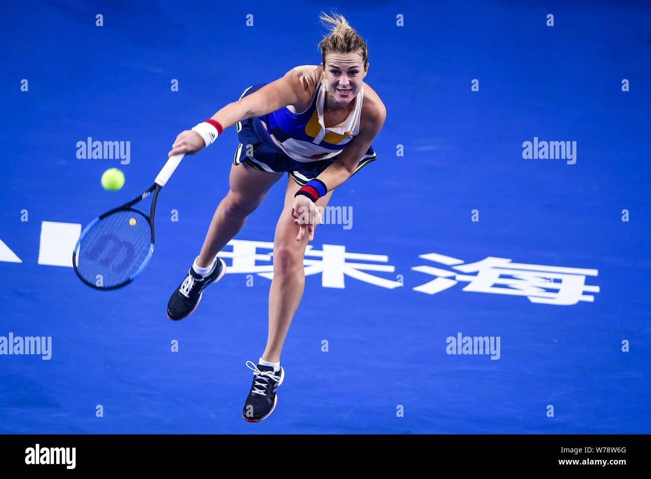 Anastasia Pavlyuchenkova of Russia serves against Angelique Kerber of Germany in the Group D of the women's singles during the Hengqin Life WTA Elite Stock Photo