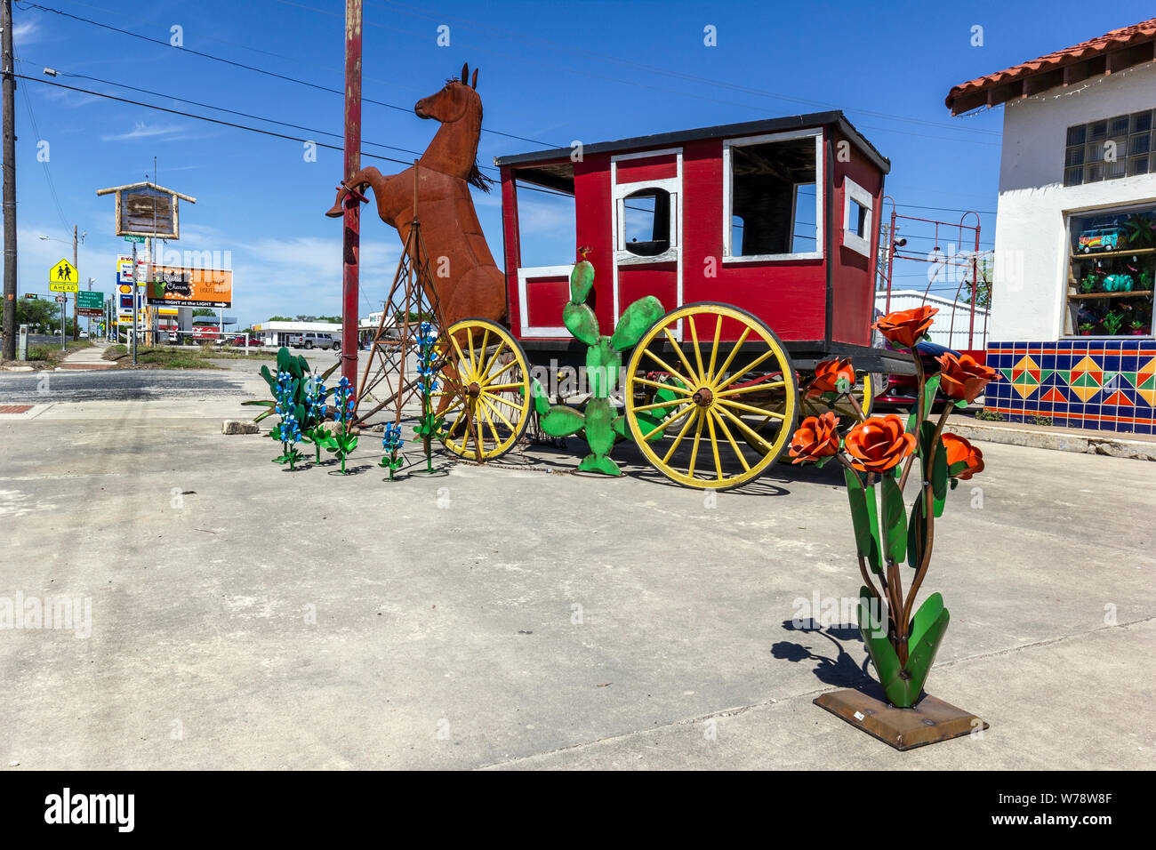 Metal horse and carriage outside The Texas Ranch House, gift retail shop, Sabinal, Texas, USA
