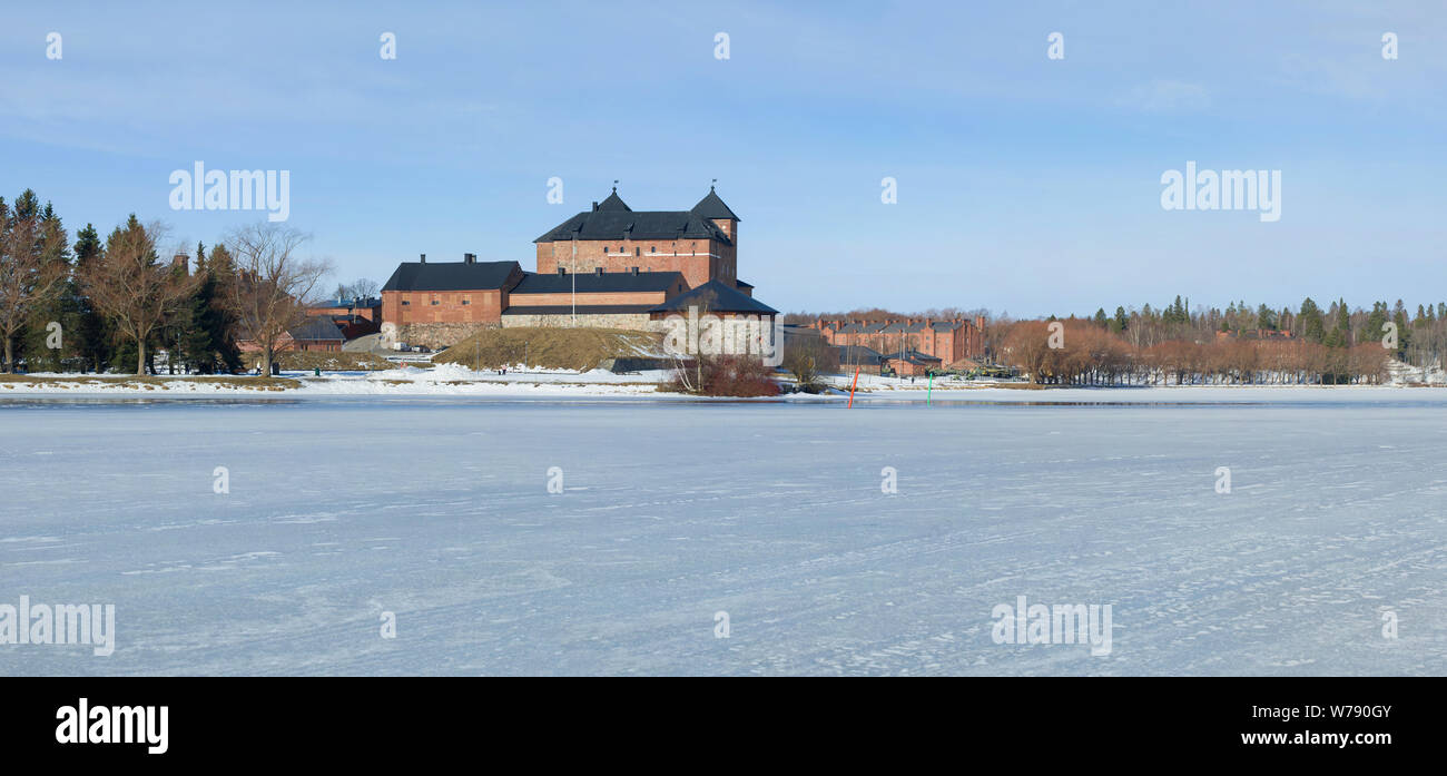 Panorama of Vanajavesi lake overlooking the ancient fortress of the Hameenlinna sity  on a March morning. Finland Stock Photo