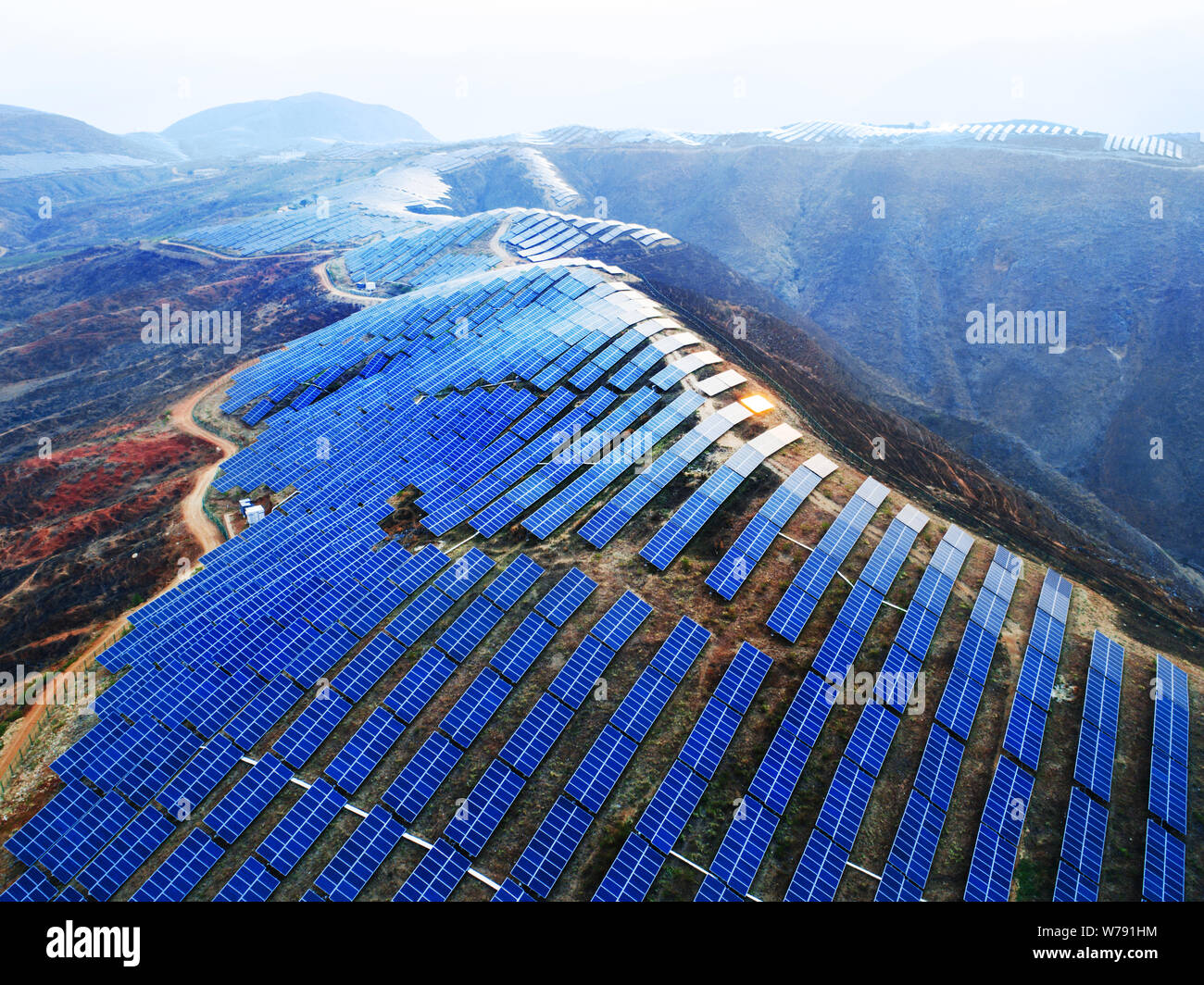 file-solar-panels-are-installed-at-a-photovoltaic-pv-power-plant-of-panda-green-group-in-yongsheng-county-lijiang-city-southwest-chinas-yunnan-W791HM.jpg