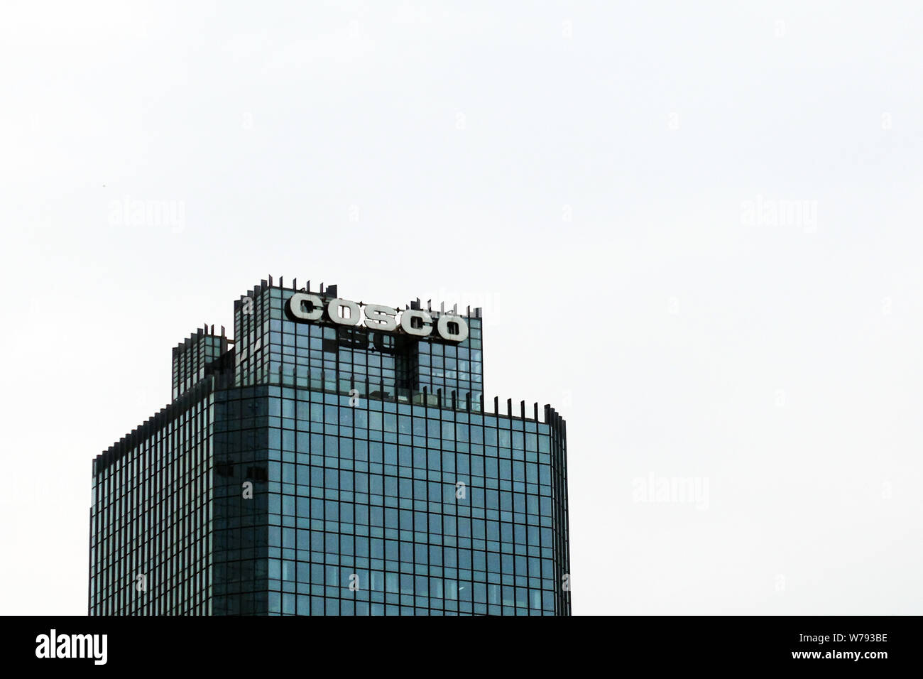 --FILE--A logo of COSCO is pictured on the rooftop of a building in Ji'nan city, east China's Shandong province, 28 July 2016.   China's COSCO Shippin Stock Photo