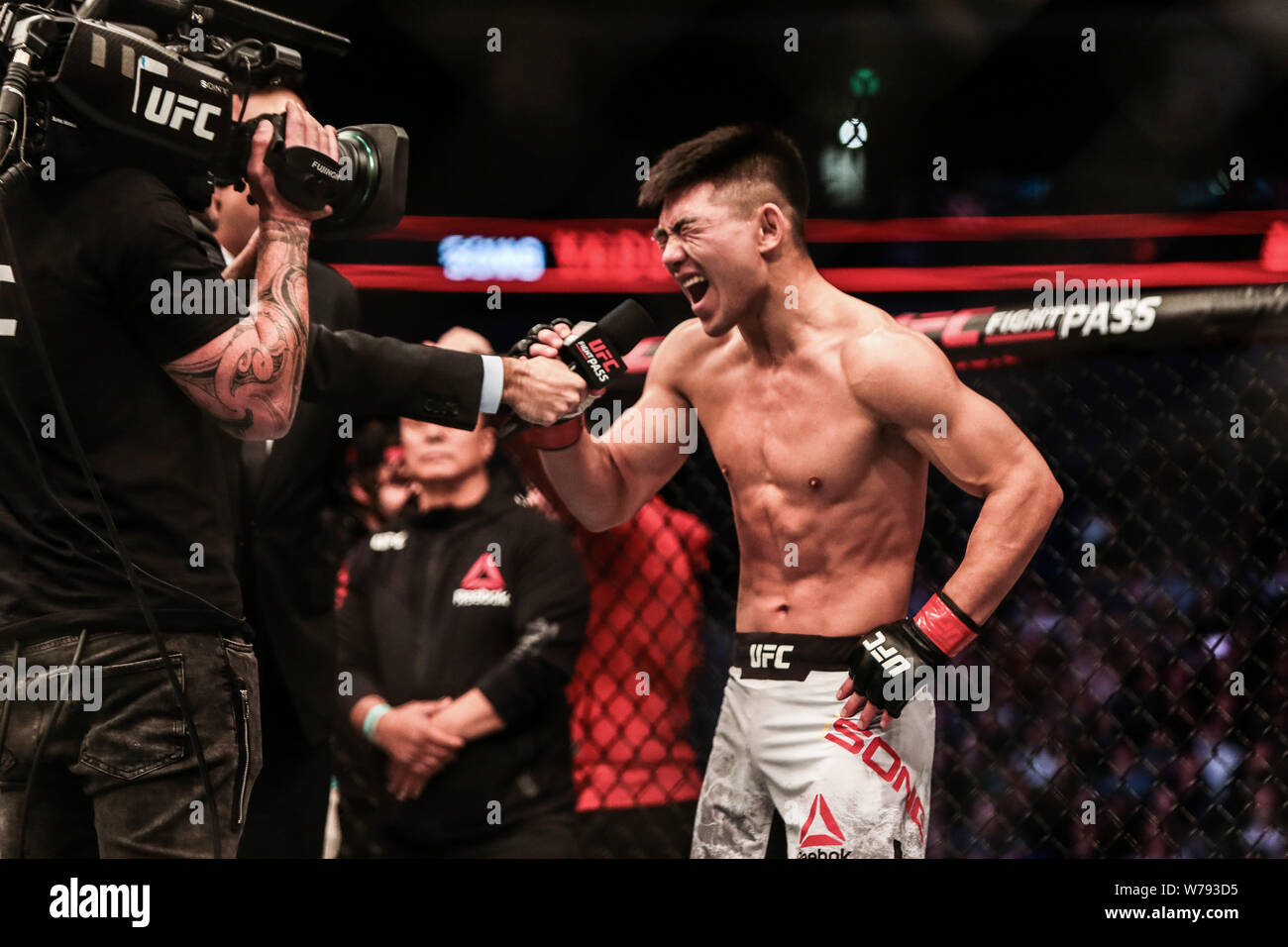 Chinese mixed martial artist Song Yadong receives an interview after