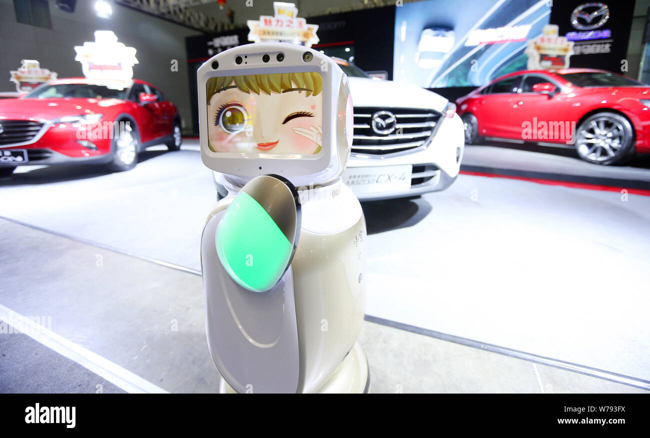 An intelligent robot is on display during the Xinjiang Autumn Auto Expo 2017 at the Xinjiang International Exhibition Center in Urumchi, northwest Chi Stock Photo