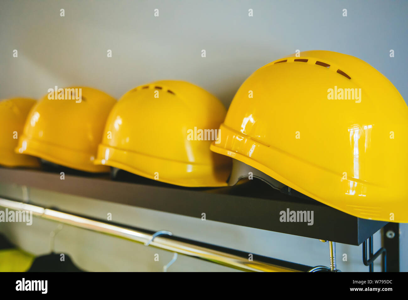 Yellow hard hat safety construction helmets. Job security protection