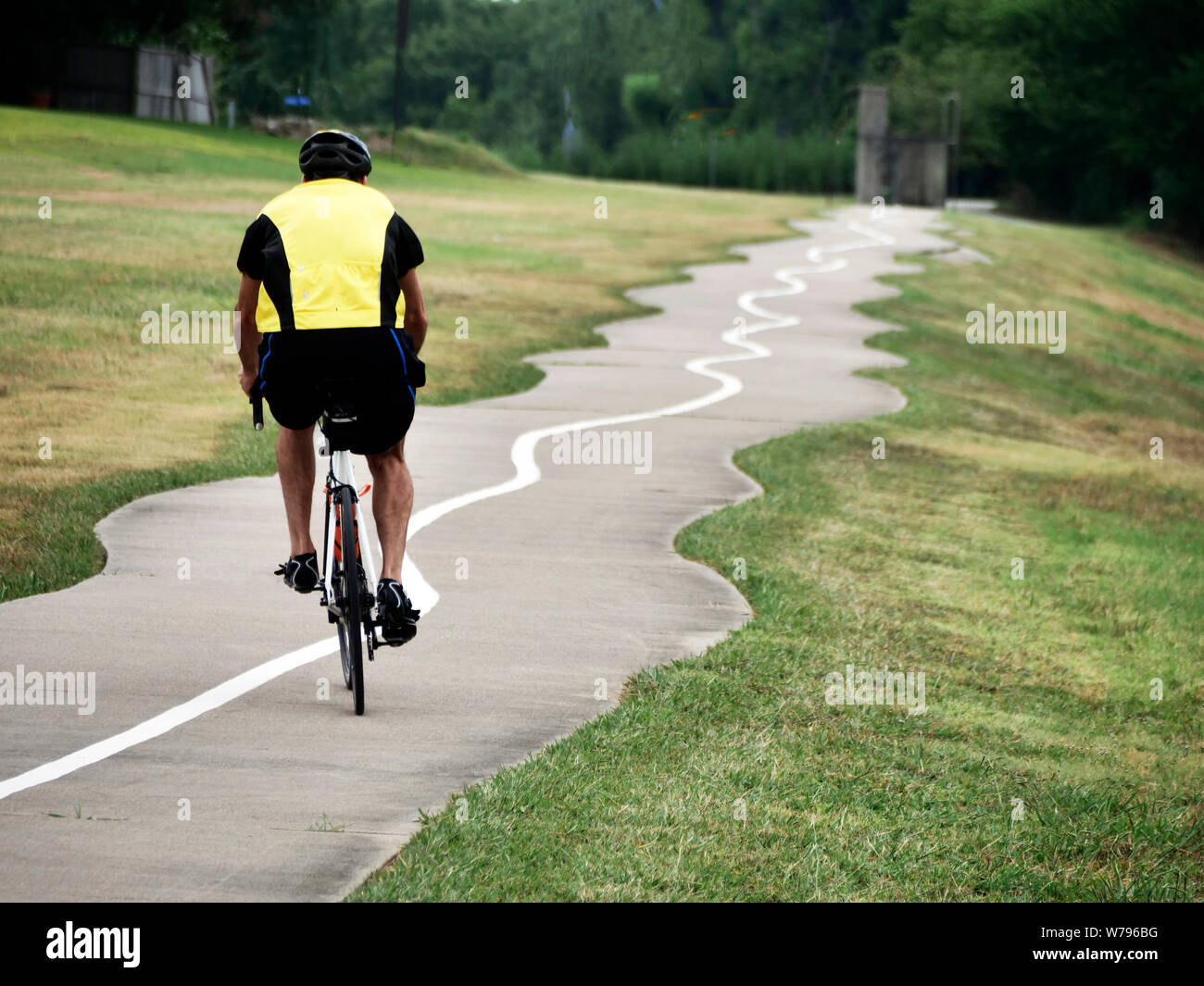 Winding way gives thoughts to the challenges in life to go straight. Life isn't that easy there are twists and turns. Wellness seniors need stay fit. Stock Photo