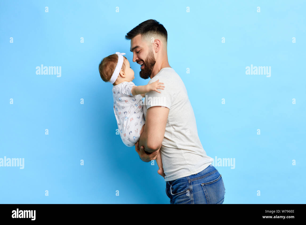 Positive Caring Dad Enjoying Time With Baby Close Up Side View Photo Isolated Blue Background I Love You My Daughter You Are My Life Stock Photo Alamy