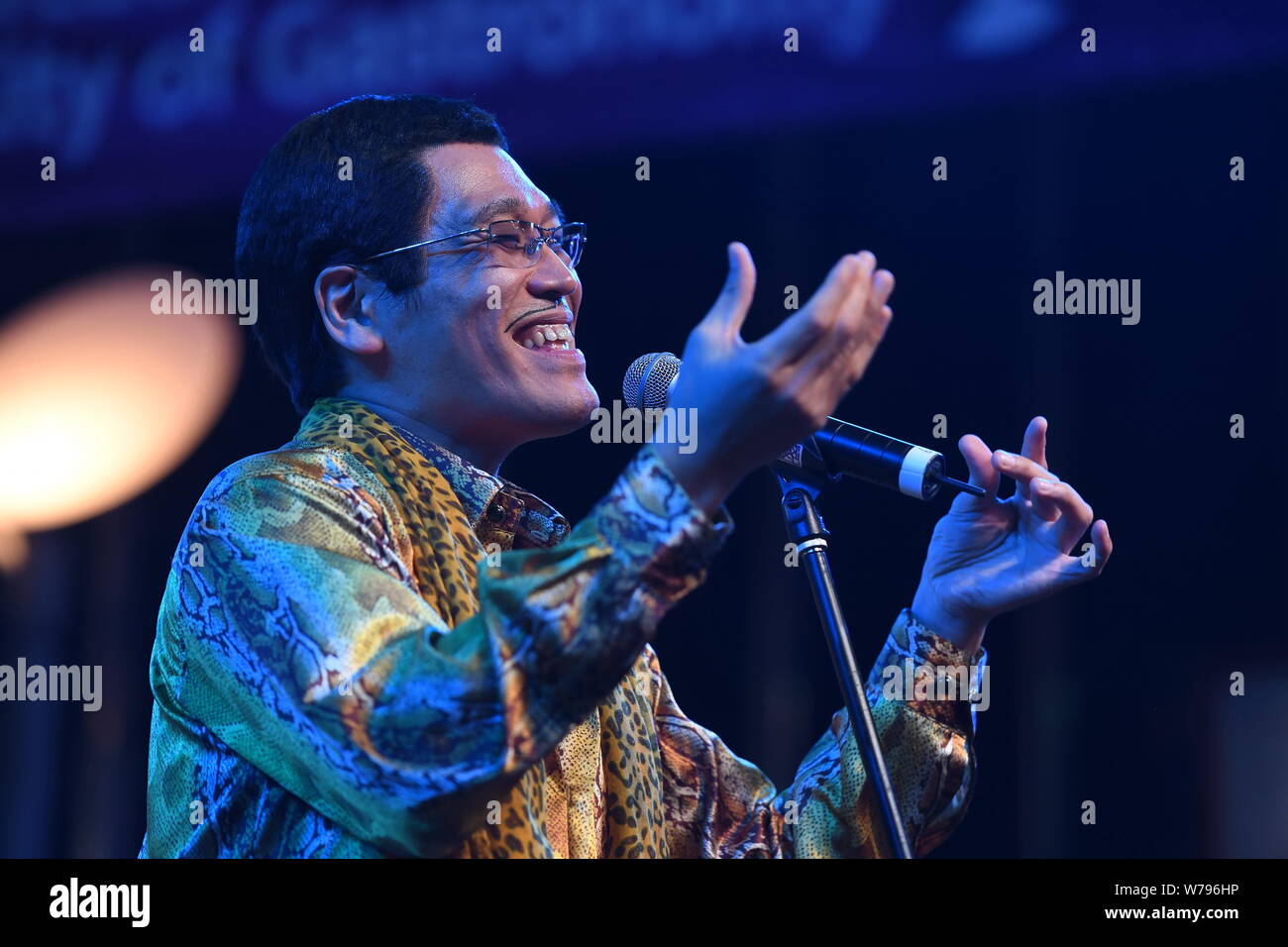 Japanese Comedian And Singer Songwriter Kazuhito Kosaka Better Known By His Stage Names Daimaou Kosaka And Pikotaro Sings His Song Ppap Pen Pineapp Stock Photo Alamy