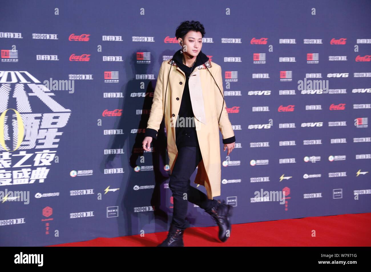 Chinese singer and actor Huang Zitao, better known as Z.Tao, poses as he  arrives at the red carpet for Lofficiel Fashion Night 2017 in Beijing,  China Stock Photo - Alamy