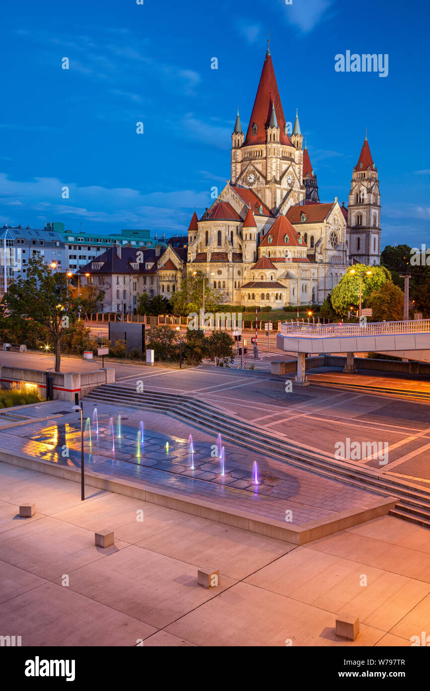 Vienna, Austria. Cityscape image of Vienna capital city of Austria with St. Francis of Assisi Church during twilight blue hour. Stock Photo