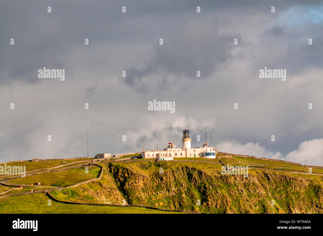 Evening light on Sumburgh Head lighthouse, Shetland. Stock Photo