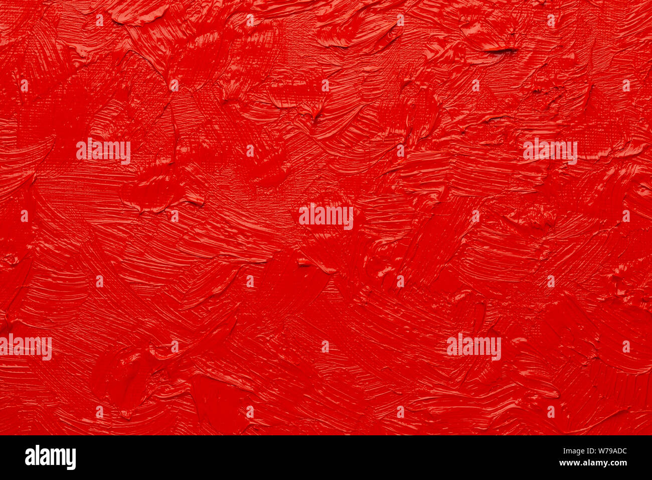 Abstract painting background. Background was painted with red vermillion oil color on canvas by hand. Stock Photo