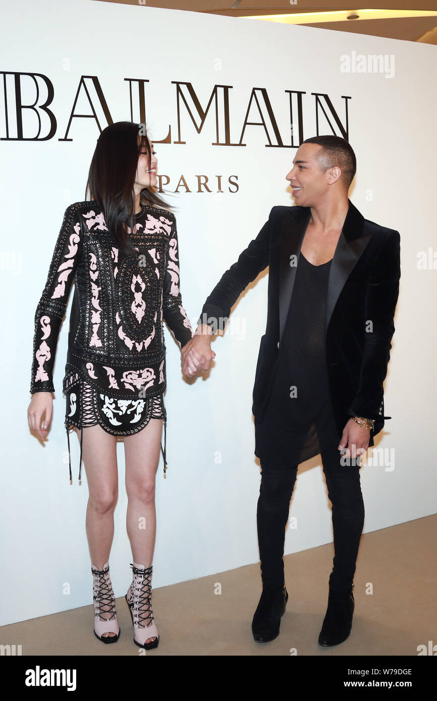 Velkendt Gør gulvet rent pegefinger French fashion designer Olivier Rousteing, right, the creative director of  Balmain, and Chinese model Xi Mengyao, better known as Ming Xi, attend the  Stock Photo - Alamy