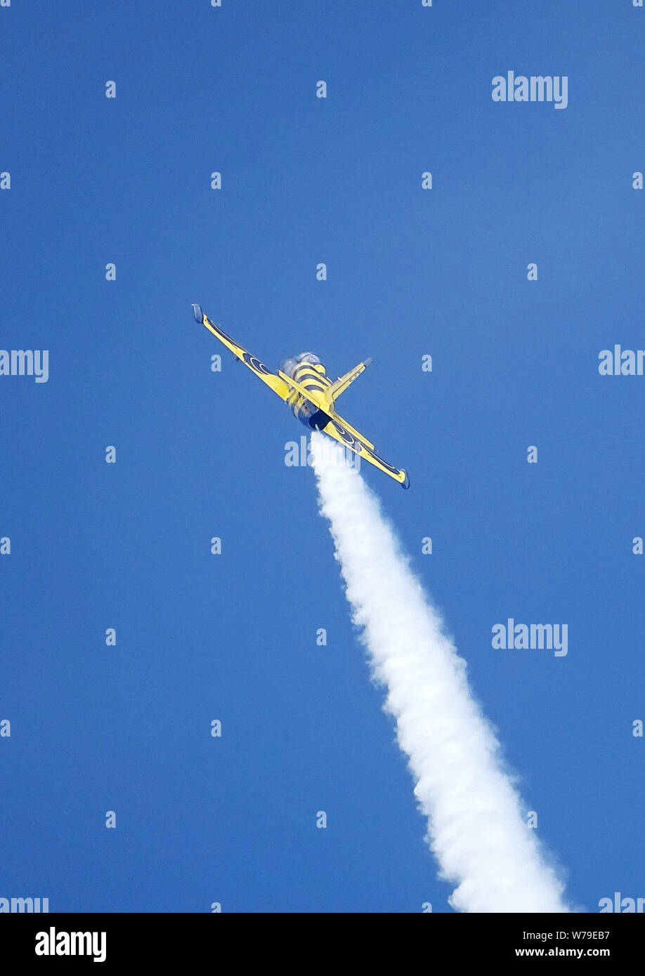 An aerobatic aircraft performs during the 2017 World Fly-In Expo (WFE) at the Hannan General Aviation Airport in Wuhan city, central China's Hubei pro Stock Photo