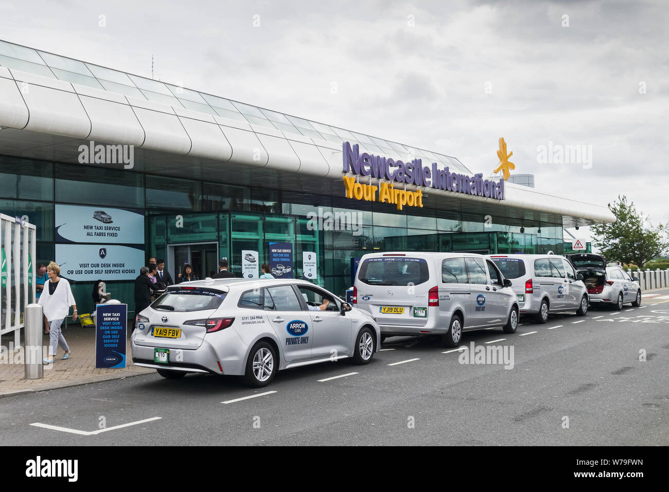 Newcastle International Airport, UK, with a line of Arrow Taxis Stock