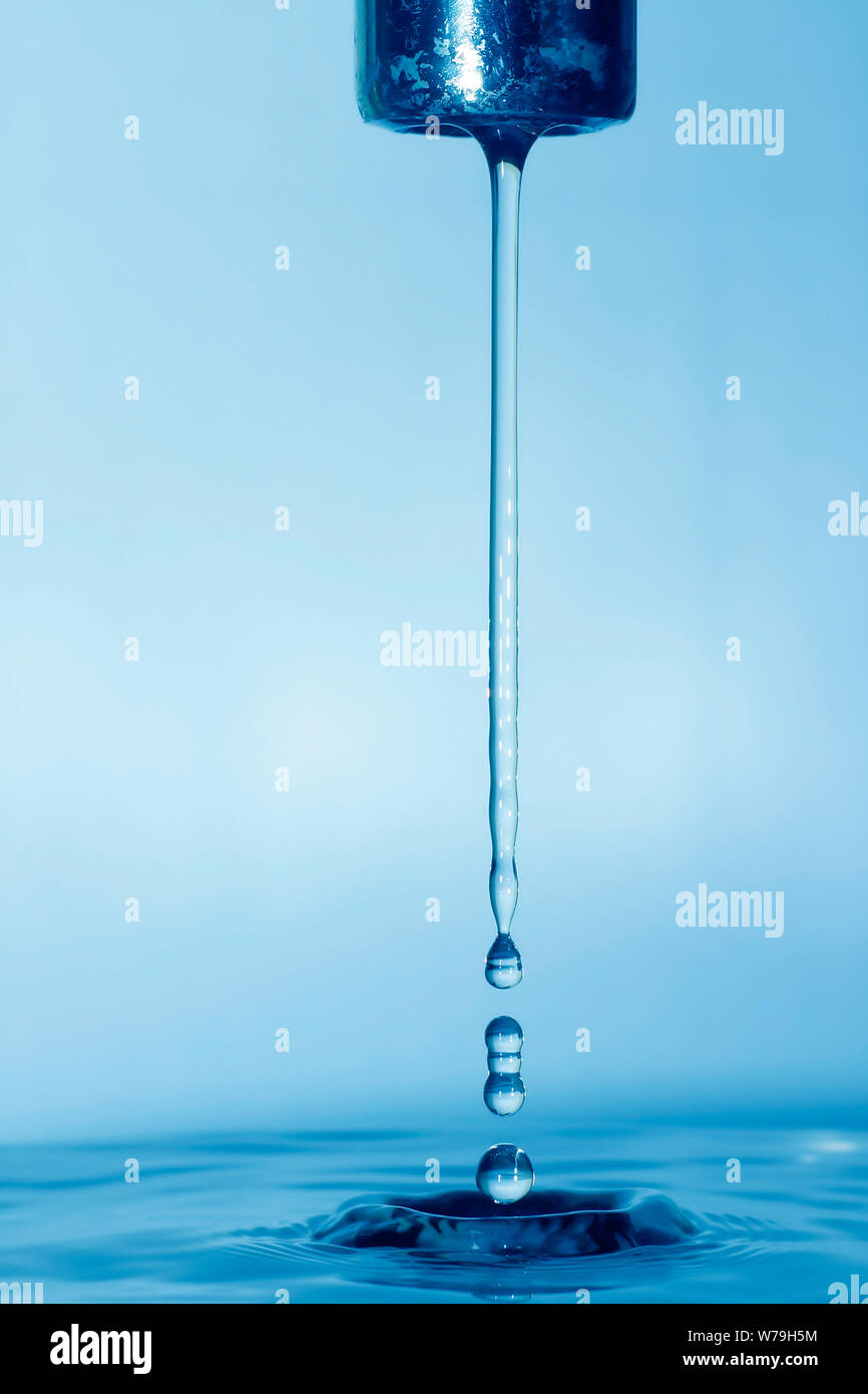 Water dripping from a faucet Stock Photo Alamy