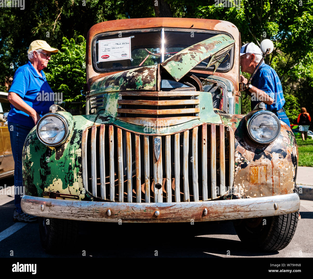 Senior couple inspecting 1941 Chevrolet truck AK Series; Angel of Shavano Car Show, fund raiser for Chaffee County Search & Rescue South, Salida, Colo Stock Photo