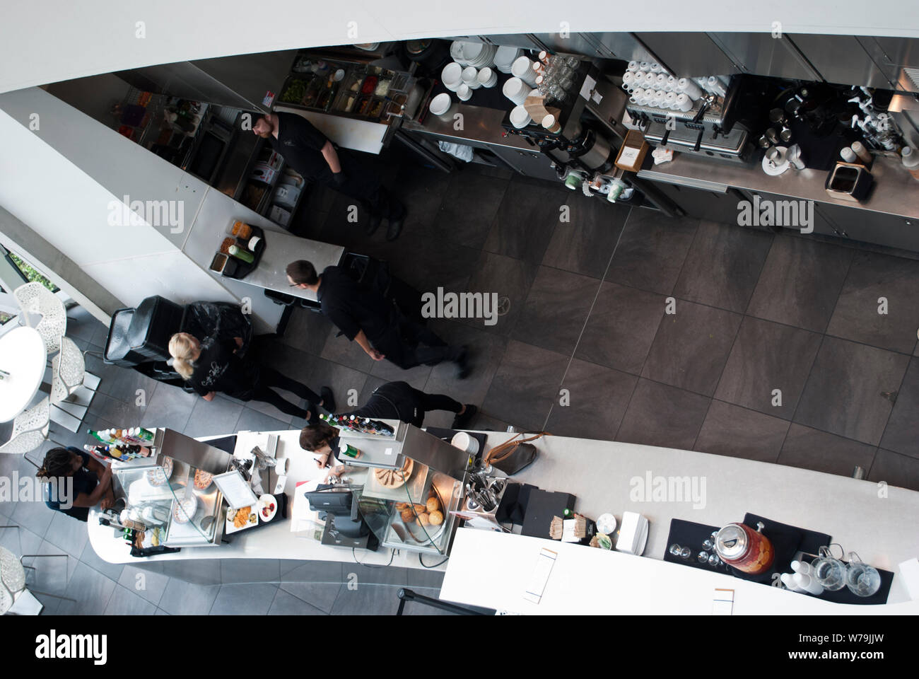 View from the top on the cafe/bar with people working Stock Photo