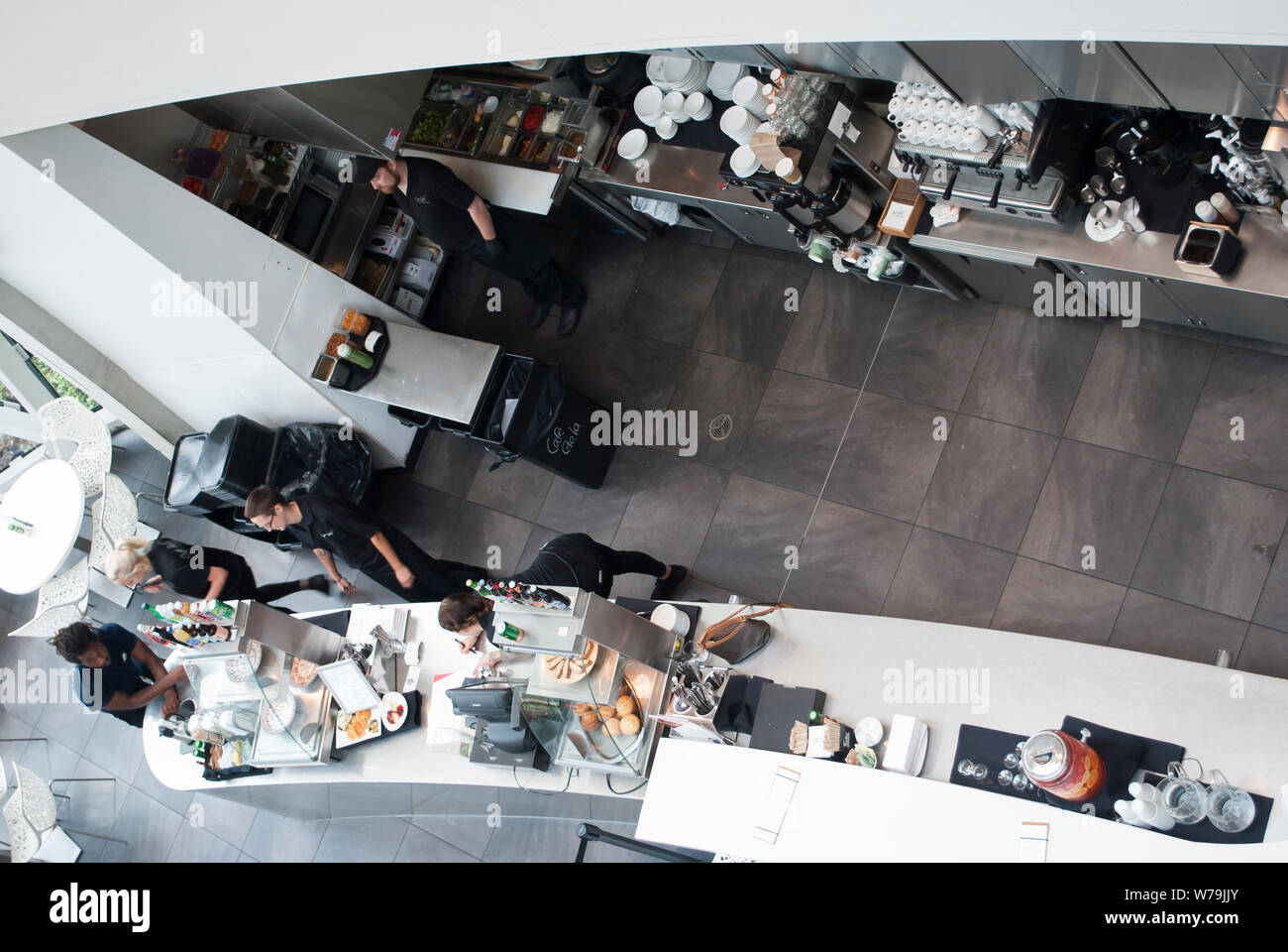 View from the top on the cafe/bar with people working Stock Photo