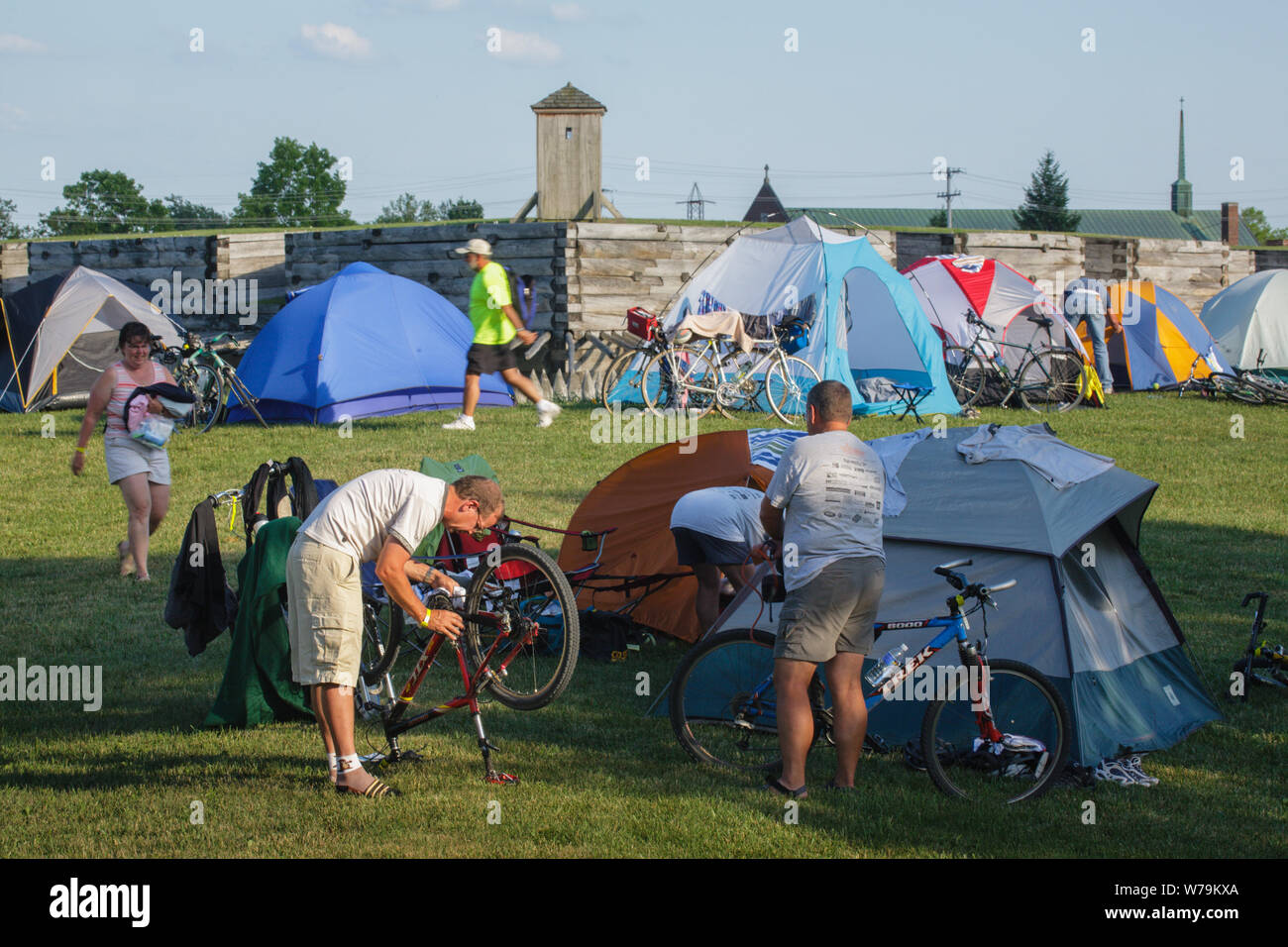 Bicyclists camp out on the grounds of Fort Stanwix, in Rome, New York, during the annual bike tour of the Erie Canal's canalway trail. Stock Photo