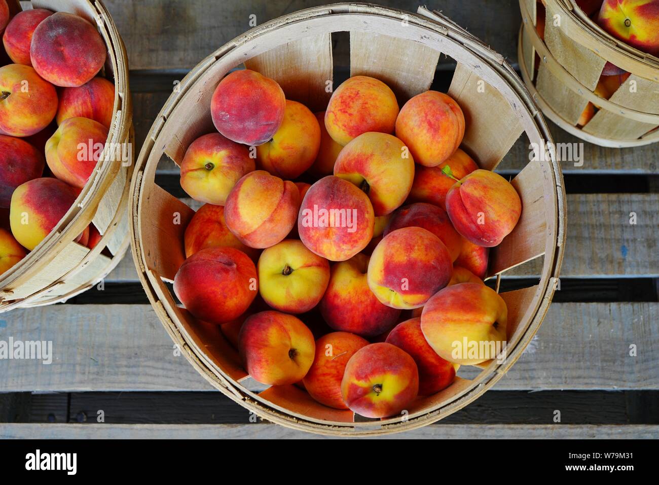 Bushels of fresh peaches in summer in New Jersey Stock Photo Alamy