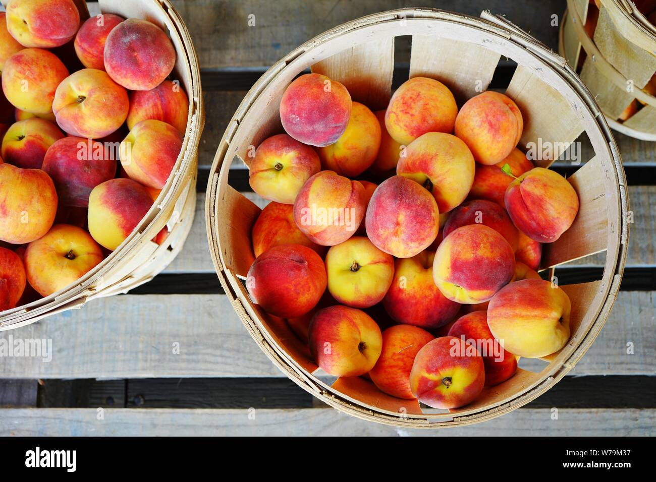 Bushels of fresh peaches in summer in New Jersey Stock Photo Alamy
