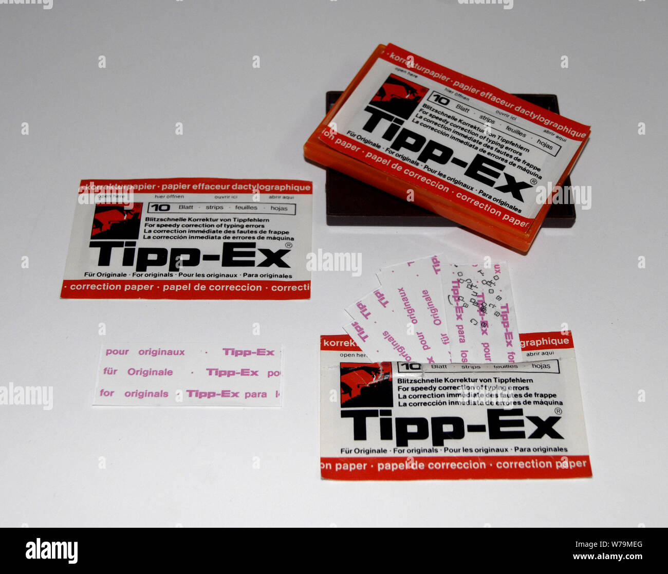 Tipp-Ex fluid Tippex with top and brush removed isolated on white  background Stock Photo - Alamy