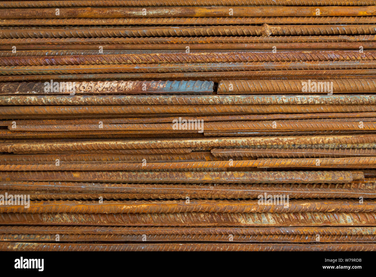 Top horizontal close up view stack of straight old rusty high yield