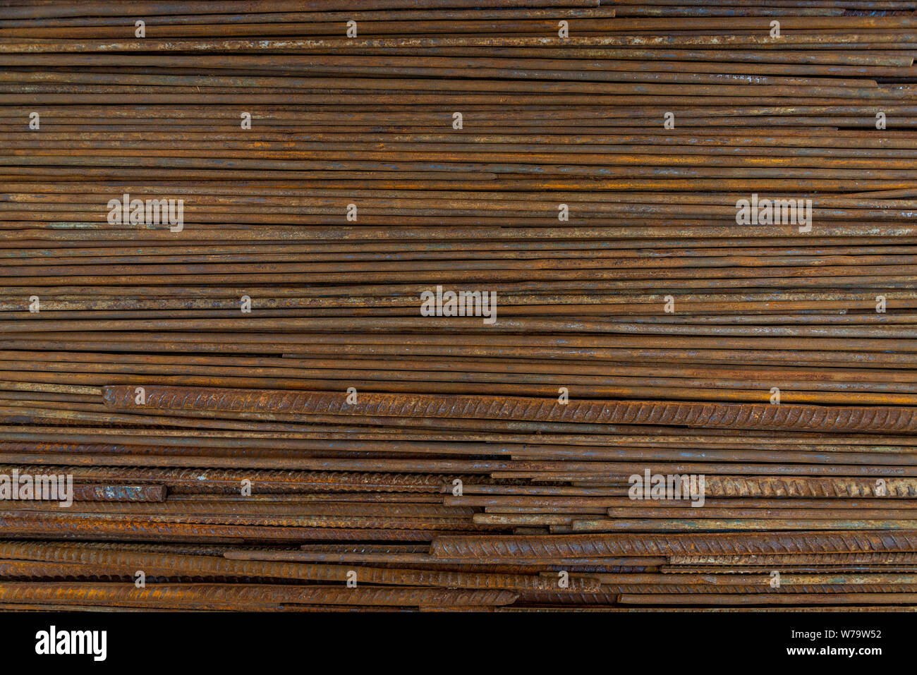 Top horizontal close up view stack of straight old rusty high yield