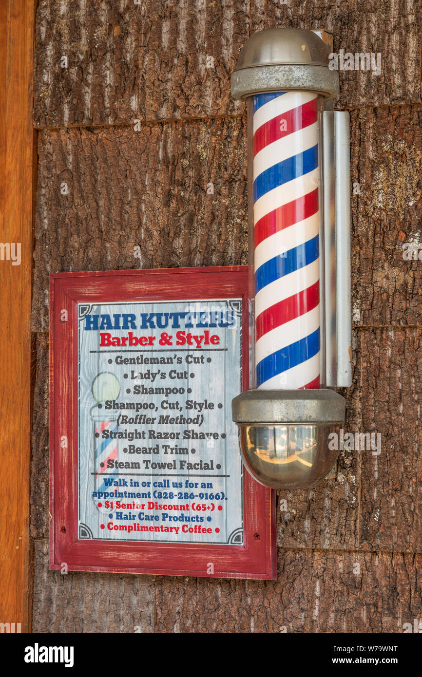 Rutherfordton, NC, USA-27 July 19: A Barber shop, Hair Kutters Barber & Style, sets on Main Street in Rutherfordton, NC. Stock Photo