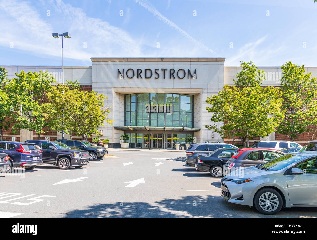 CHARLOTTE, NC, USA-28 July 19: Entrance to Nordstrom Department store, with crowded parking lot on a sunny summer day. Stock Photo