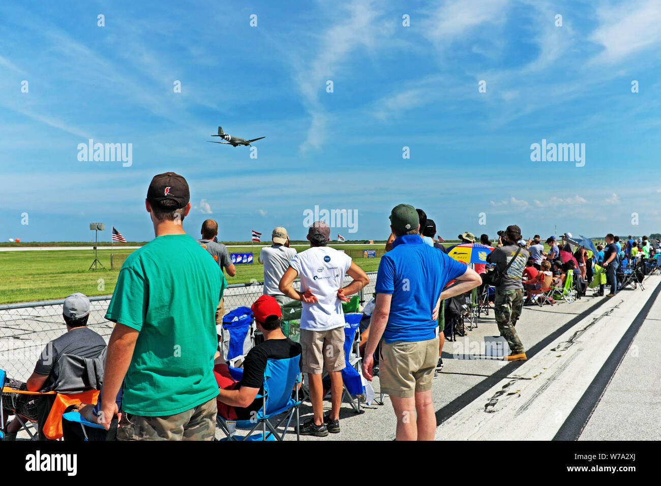 Spectators watch a performance at the 2108 Cleveland National Air Show at Burke Lakefront Airport in downtown Cleveland, Ohio, USA. Stock Photo